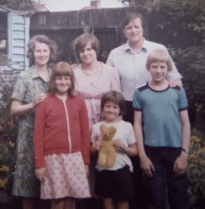 Our family, circa 1977. Left to right: Mum, Sally, Jane, Robert, Dad, Me